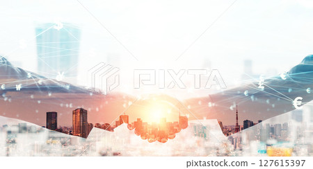 Group of business people shaking hands and financial technology concept Horizontal visual for banner and advertising Group of business people shaking hands and financial technology concept Horizontal visual for banner and advertising 127615397