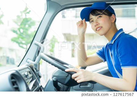Young woman driver Young woman driver 127617567