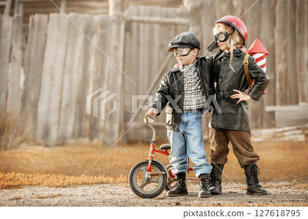 Children play in the rider and the rocketman Children play in the rider and the rocketman 127618795