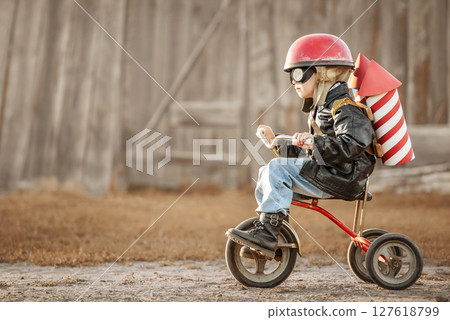 Boy play in the rider and the rocketman 127618799