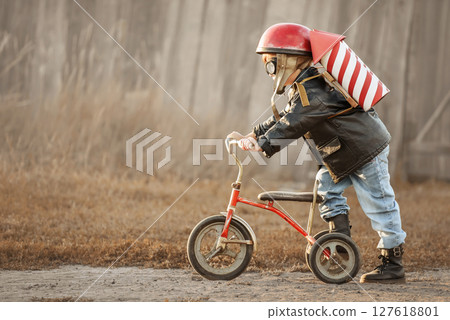 Boy play in the rider and the rocketman 127618801