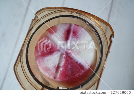 Milk and grape juice frozen 127619060