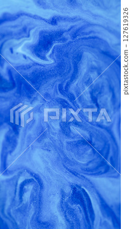Sparkling flow. Ink mix. Blue white shimmering emulsion defocused enamel stream blend color. Art acrylic pigment blur abstract background. Sparkling flow. Ink mix. Blue white shimmering emulsion defocused enamel stream blend color. Art acrylic pigment blur abstract background. 127619326