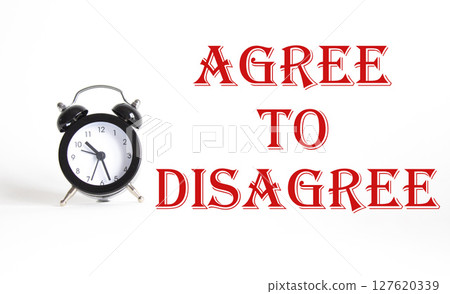 Agree to Disagree symbol. Beautiful white background with alarm clock. Business and Agree to Disagree concept. Copy space. Agree to Disagree symbol. Beautiful white background with alarm clock. Business and Agree to Disagree concept. Copy space. 127620339