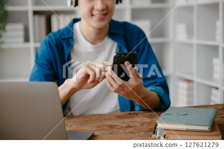 businessman hand working with new modern computer using on smartphone and tablet as concept businessman hand working with new modern computer using on smartphone and tablet as concept 127621279