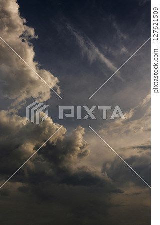 Vertical Dramatic dark storm rain clouds black sky background. Dark thunderstorm clouds rainny atmosphere. windstorm disasters climate. Dust ominous cloudscape storm disaster gloomy gray cloud sky Vertical Dramatic dark storm rain clouds black sky background. Dark thunderstorm clouds rainny atmosphere. windstorm disasters climate. Dust ominous cloudscape storm disaster gloomy gray cloud sky 127621509