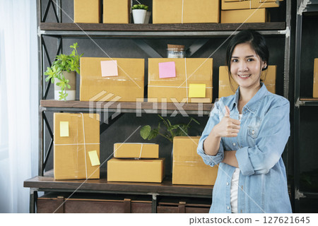 Portrait Businesswoman arms crossed smiling look at camera in modern city background. Happy Business people positive achievement standing and smile. Happy leader executive young asian women leader Portrait Businesswoman arms crossed smiling look at camera in modern city background. Happy Business people positive achievement standing and smile. Happy leader executive young asian women leader 127621645
