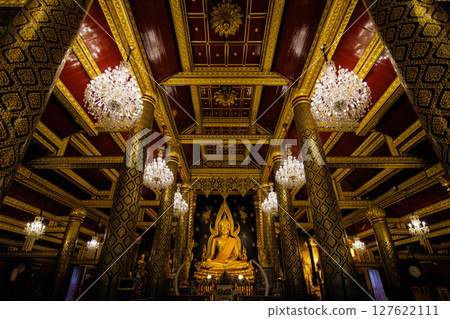 Beautiful Golden Buddha statues of the statue of ancient thai art style at Wat Phra Si Rattana Mahathat to as Wat Yai is a Buddhist temple It is a major tourist Phitsanulok,Thailand. Beautiful Golden Buddha statues of the statue of ancient thai art style at Wat Phra Si Rattana Mahathat to as Wat Yai is a Buddhist temple It is a major tourist Phitsanulok,Thailand. 127622111