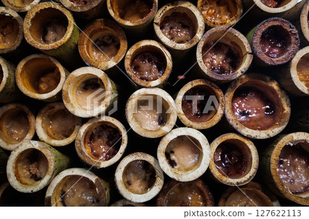 Close-up of Khao Lam snacks in bamboo tubes, Nong Mon, Chon Buri, Thailand Close-up of Khao Lam snacks in bamboo tubes, Nong Mon, Chon Buri, Thailand 127622113
