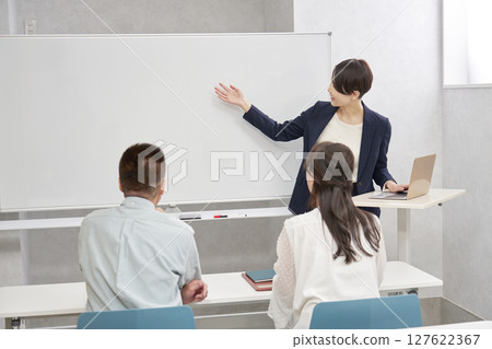 Businesswoman speaking at a seminar Businesswoman speaking at a seminar 127622367