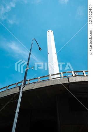 Looking up at street lights and tall chimneys b-3 Light color 127622494