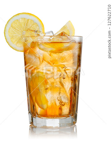 misted glass of ice tea with lemon isolated on white background 127622710