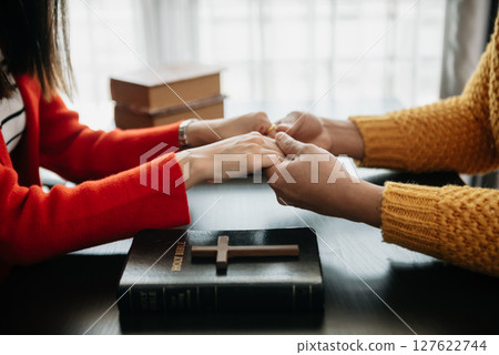 Christians are congregants join hands to pray and seek the blessings of God, the Holy Bible.Study the Word of God 127622744