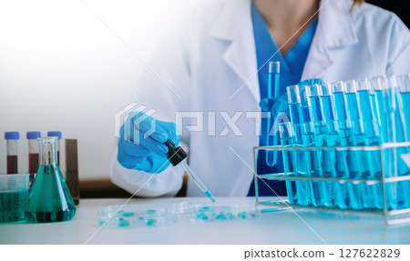 Dctor work on digital tablet healthcare doctor technology tablet using computer  in laboratory study with virtual icon 127622829