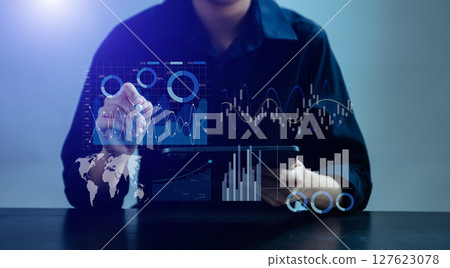 Team colleagues wear formal attire to work together to optimize business processes by using new technologies. high tech hologram Team colleagues wear formal attire to work together to optimize business processes by using new technologies. high tech hologram 127623078