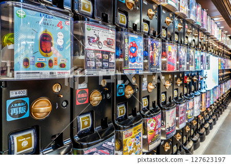 A row of capsule toy vending machines A row of capsule toy vending machines 127623197