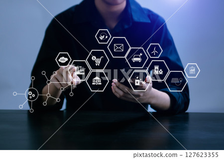 ESG concept of environmental, Green ethical business preserving resources, reducing CO2, Business person working on laptop virtual smartphone to reduce CO2 ESG concept of environmental, Green ethical business preserving resources, reducing CO2, Business person working on laptop virtual smartphone to reduce CO2 127623355