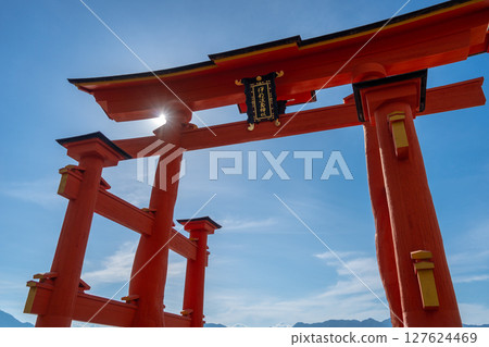 Close-up view of the famous Itsukushima shrine red torii gate in Miyajima, Japan Close-up view of the famous Itsukushima shrine red torii gate in Miyajima, Japan 127624469