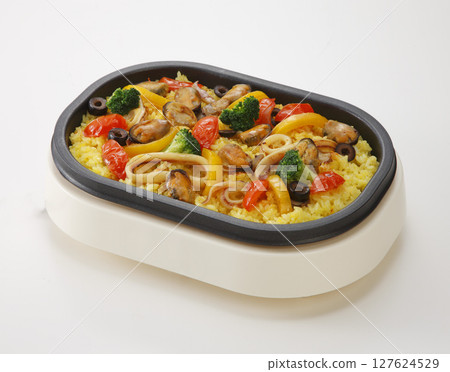 Paella made on a small hot plate Paella made on a small hot plate 127624529