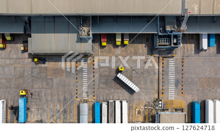 Aerial view semi truck cargo trailer at logistic park warehouse goods, Distribution warehouse shipping supply chain, Business transportation logistic freight shipping cargo by semi truck cargo trailer Aerial view semi truck cargo trailer at logistic park warehouse goods, Distribution warehouse shipping supply chain, Business transportation logistic freight shipping cargo by semi truck cargo trailer 127624718