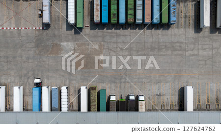 Aerial view semi truck cargo trailer at logistic park warehouse goods, Distribution warehouse shipping supply chain, Business transportation logistic freight shipping cargo by semi truck cargo trailer 127624762