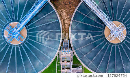 Aerial view circular clarifier tank at watewater treatment plant, Industrial infrastucture, Environment technology sustainable water management system, Semimentation tank circular clarifier. 127624764