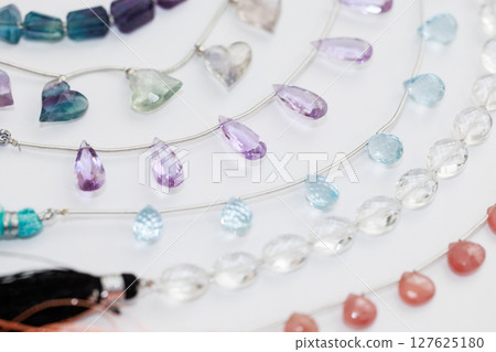 Colorful natural stone beads stock photo White background Colorful natural stone beads stock photo White background 127625180