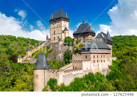 Karlstejn Castle surrounded by hills and forests. Central Bohemia, Czech Republic Karlstejn Castle surrounded by hills and forests. Central Bohemia, Czech Republic 127625446
