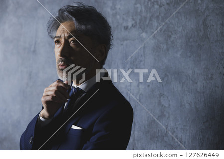 Gray-haired businessman Gray-haired businessman 127626449