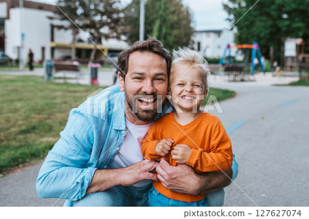 Portrait of dad and child enjoying time together 127627074