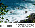Blue Waves Breaking on the Coral Reef on the Tropical Coast of Sumatra, Lampung 127628529