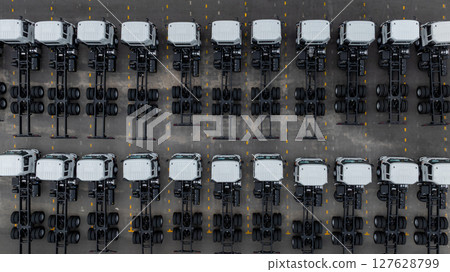 Aerial view semi truck cargo trailer at logistic park warehouse goods, Distribution warehouse shipping supply chain, Business transportation logistic freight shipping cargo by semi truck cargo trailer Aerial view semi truck cargo trailer at logistic park warehouse goods, Distribution warehouse shipping supply chain, Business transportation logistic freight shipping cargo by semi truck cargo trailer 127628799