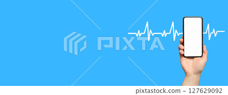 Hand holding a smartphone showing health metrics on a blue background with heartbeat Hand holding a smartphone showing health metrics on a blue background with heartbeat 127629092