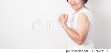 Elderly Woman with bandage after received vaccine. Vaccination and Immunization for Influenza, Herpes Zoster, Tetanus, Covid 19 booster, Dengue, Encephalitis, Rabies, Pneumococcal, IPD, RSV Vaccines Elderly Woman with bandage after received vaccine. Vaccination and Immunization for Influenza, Herpes Zoster, Tetanus, Covid 19 booster, Dengue, Encephalitis, Rabies, Pneumococcal, IPD, RSV Vaccines 127629494