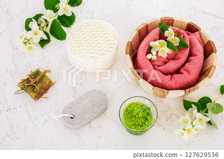 Spa products for facial and body care with soft terry towel. Spa products for facial and body care with soft terry towel. 127629536