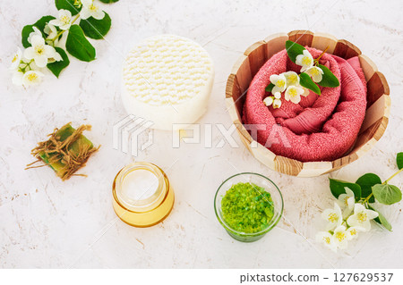 Spa products for facial and body care with soft terry towel. 127629537