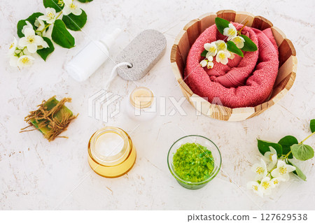 Spa products for facial and body care with soft terry towel. 127629538