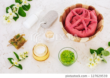 Spa products for facial and body care with soft terry towel. 127629539