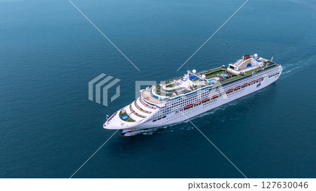 Aerial view luxury ocean cruise ship on clam blue sea, Elegant modern travel lifestyle, Luxury cruise ship liner modern maritime business ocean tourism, Global business cruise ship liner industry. 127630046