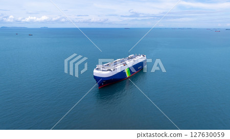 Aerial view RoRo Ship business logistic and transportation sea freight, Cargo and RoRo ship Roll On Roll Off ship at sea, Car carrier ship RO-RO Roll on Roll off. 127630059