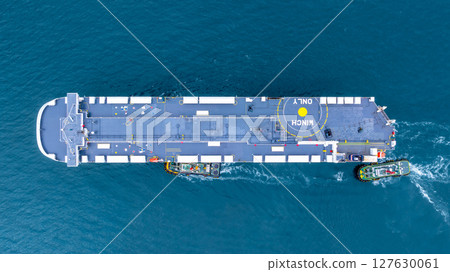 Aerial view RoRo Ship business logistic and transportation sea freight, Cargo and RoRo ship Roll On Roll Off ship at sea, Car carrier ship RO-RO Roll on Roll off. Aerial view RoRo Ship business logistic and transportation sea freight, Cargo and RoRo ship Roll On Roll Off ship at sea, Car carrier ship RO-RO Roll on Roll off. 127630061