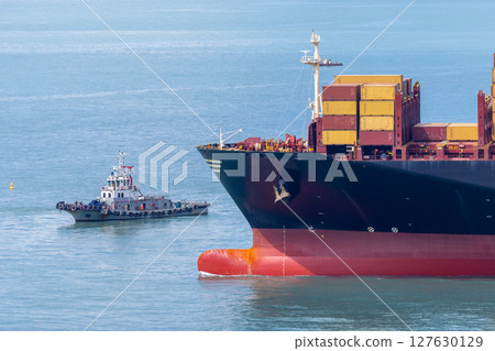 Aerial view container cargo ship freight shipping international, Global business freight shipping import export logistic transportation container ship, Container cargo ship sea freight container ship. Aerial view container cargo ship freight shipping international, Global business freight shipping import export logistic transportation container ship, Container cargo ship sea freight container ship. 127630129