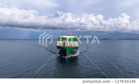 Fully loaded container cargo ship at sea, Global logistic maritime freight transport, Container cargo ship freight shipping international import export logistic sea freight cargo shipping. Fully loaded container cargo ship at sea, Global logistic maritime freight transport, Container cargo ship freight shipping international import export logistic sea freight cargo shipping. 127630146