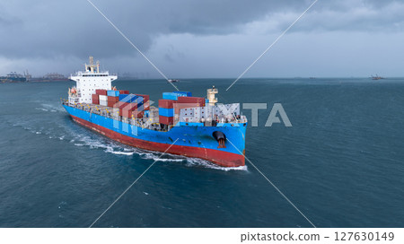 Aerial view container cargo ship freight shipping international, Global business freight shipping import export logistic transportation container ship, Container cargo ship sea freight in rain storm 127630149