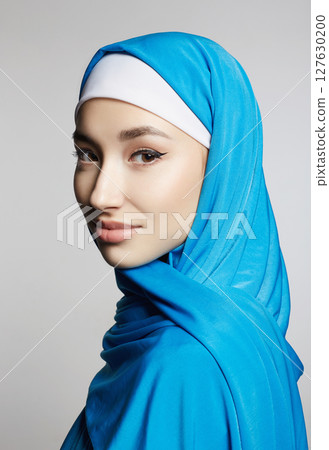 beautiful young muslim woman. beauty happy girl in hijab 127630200
