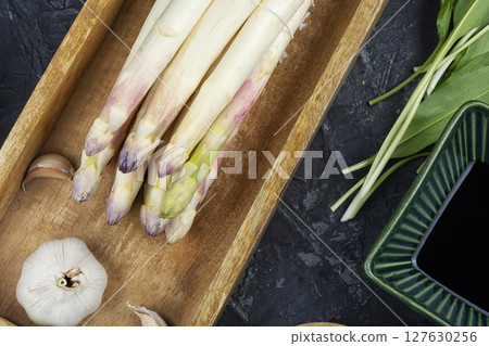 Bundles of white asparagus. 127630256