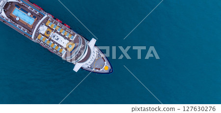 Aerial view luxury ocean cruise ship with swimming pool sun deck lounge chairs on clam blue sea, Elagant modern travel lifestlye, Luxury cruise ship liner modern maritime business ocean tourism, 127630276