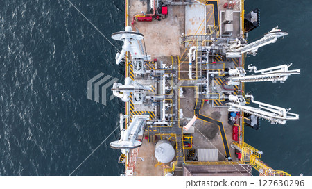 Aerial view industrial offshore oil gas terminal tanker ship, Global energy supply chain marine logistic transportation infrastructure, Oil gas industrial terminal tanker ship energy logistic industry Aerial view industrial offshore oil gas terminal tanker ship, Global energy supply chain marine logistic transportation infrastructure, Oil gas industrial terminal tanker ship energy logistic industry 127630296