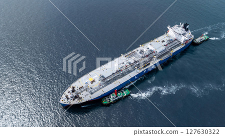 Aerial view LPG gas tanker ship on deep blue sea, Global business freight shipping import export logistic transportation oil and gas product tanker ship, Liquefied Petroleum Gas LPG tanker ship in sea Aerial view LPG gas tanker ship on deep blue sea, Global business freight shipping import export logistic transportation oil and gas product tanker ship, Liquefied Petroleum Gas LPG tanker ship in sea 127630322