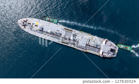 Aerial view LPG gas tanker ship on deep blue sea, Global business freight shipping import export logistic transportation oil and gas product tanker ship, Liquefied Petroleum Gas LPG tanker ship in sea Aerial view LPG gas tanker ship on deep blue sea, Global business freight shipping import export logistic transportation oil and gas product tanker ship, Liquefied Petroleum Gas LPG tanker ship in sea 127630324